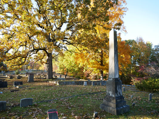 Wilcox family obelisk is the granite centerpiece of historic Tryon Cemetery. Lemuel North Wilcox from Pittsburgh, founder of Tryon City in 1877, is buried here. He donated the land and in 1896 laid out its plots with the help of his son Edwin.
