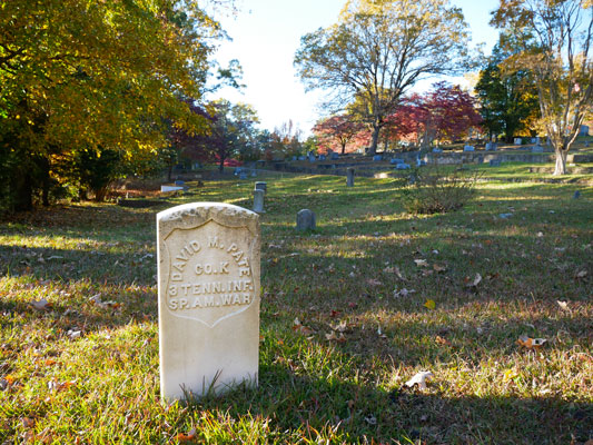 David M. Pate is one of a number of military veterans buried in Tryon Cemetery. This attractive gravestone tells that he served in US forces during the Spanish-American War.