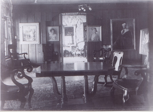 Old photo of Rock House dining room with wall art